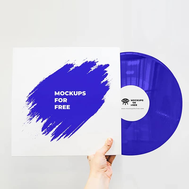 Vinyl Record In Hand Mockup