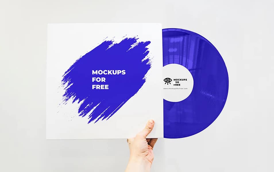 Vinyl Record In Hand Mockup