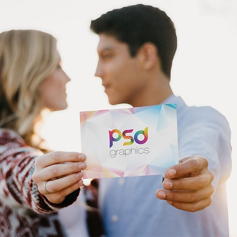 Couple Holding Invitation Card Mockup