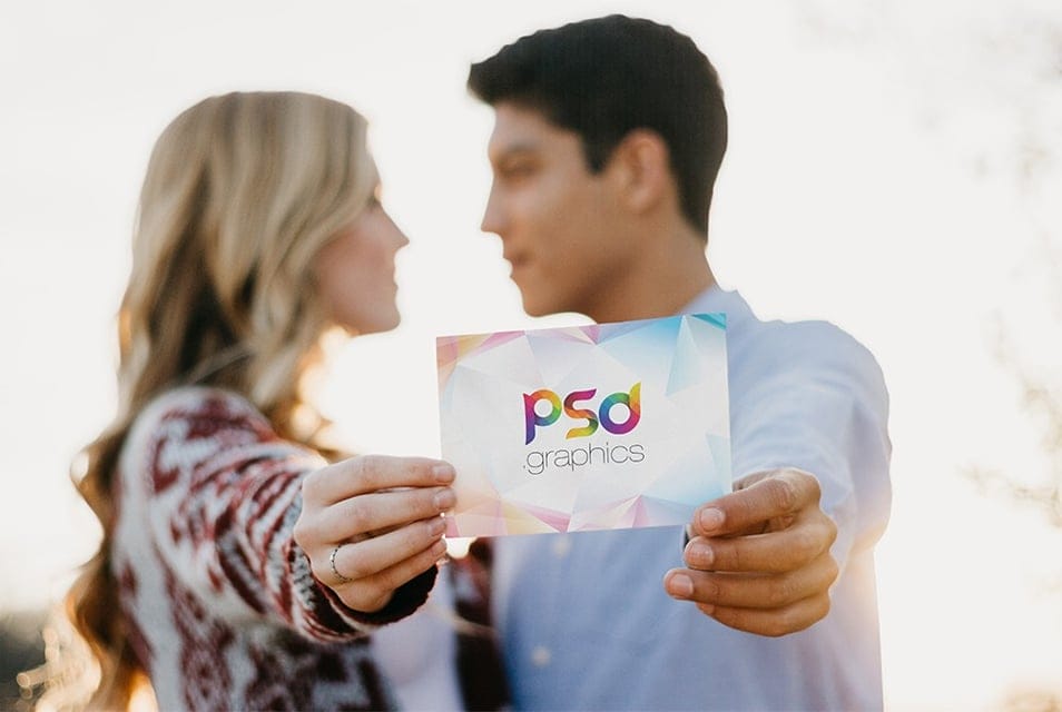 Couple Holding Invitation Card Mockup