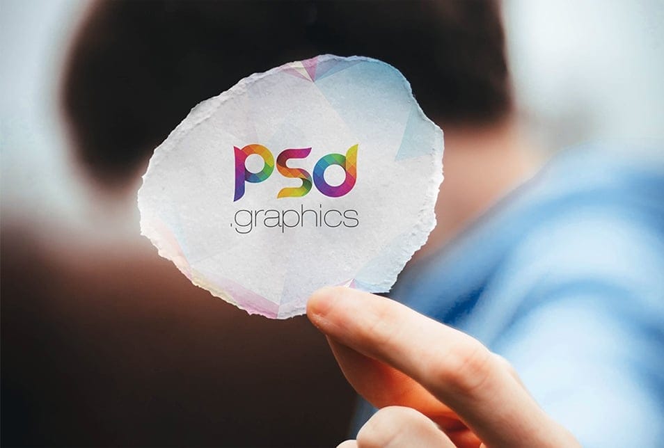 Man Holding Torn Piece of Paper Mockup