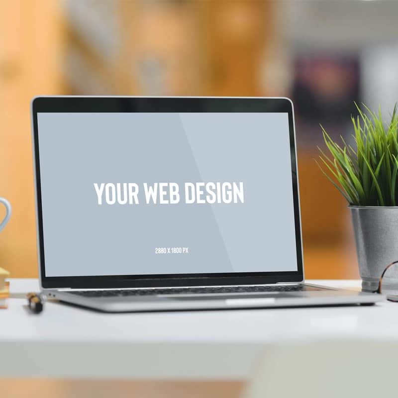 Free Mug & Laptop Website Mockup PSD