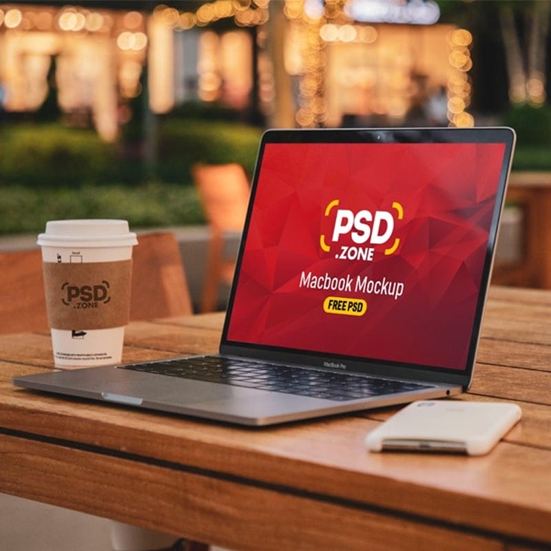 Macbook with Paper Coffee Cup Mockup