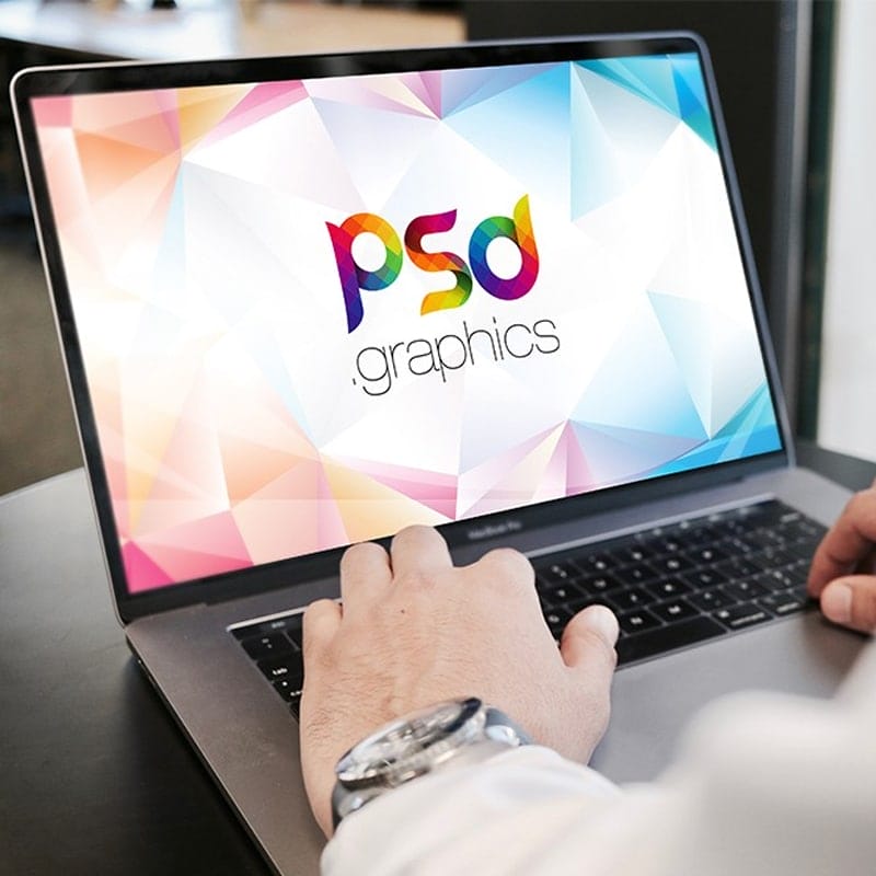 Man Working on Macbook Pro Mockup