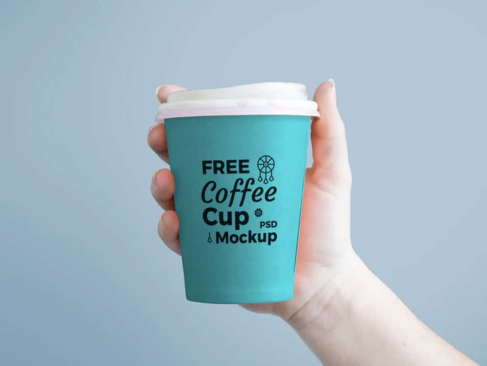 Paper Coffee Cup in Hand Mockup