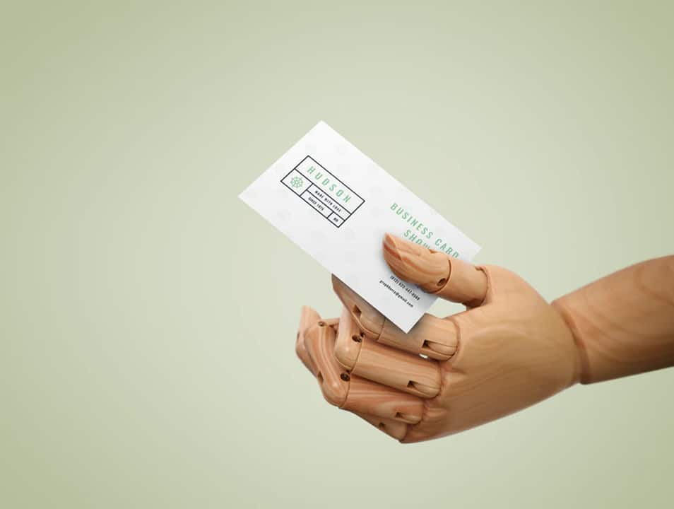 Business Card In Wooden Hand Mockup