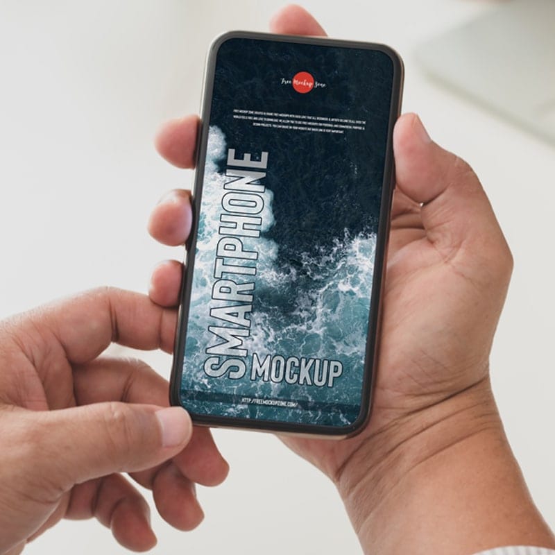 Free Person Holding Smartphone Mockup