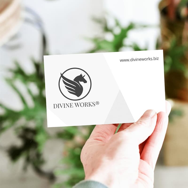 Free Single Business Card In Hand Mockup