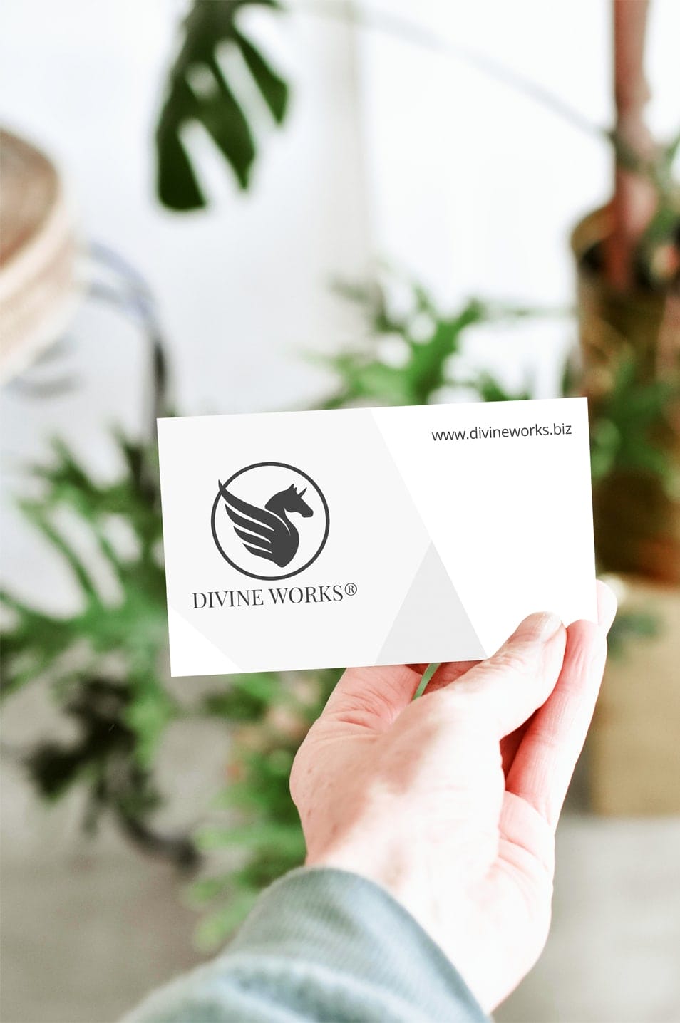 Free Single Business Card In Hand Mockup