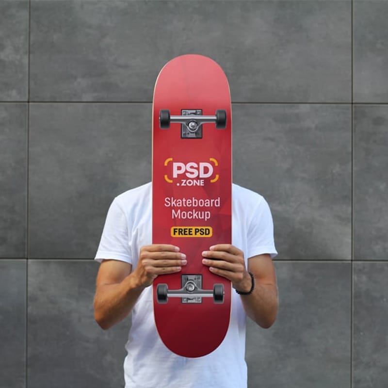 Hand Holding Skateboard Mockup PSD