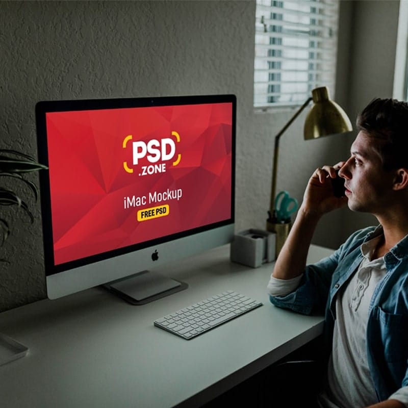 Man Using iMac Mockup PSD