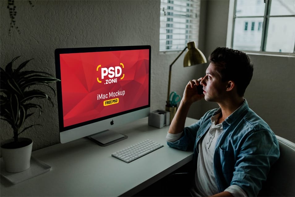 Man Using iMac Mockup PSD