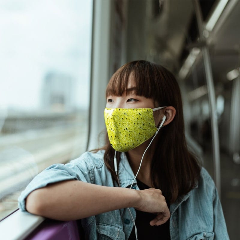 Mask Mockup With Young Woman in a Train