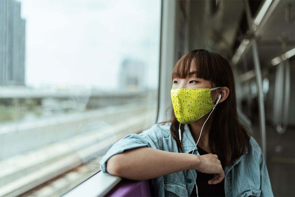Mask Mockup With Young Woman in a Train