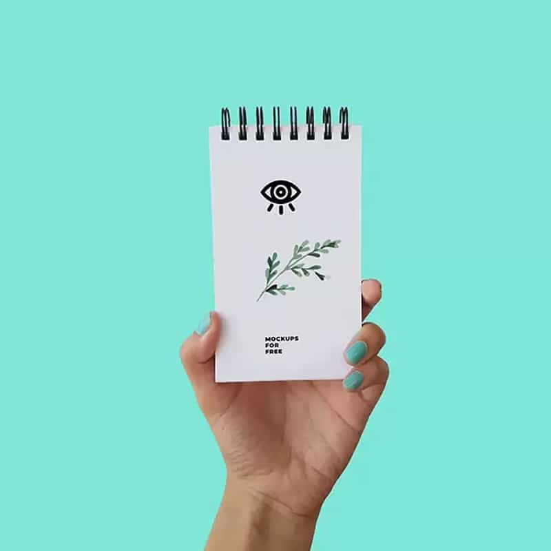 Notepad In Hand Mockup