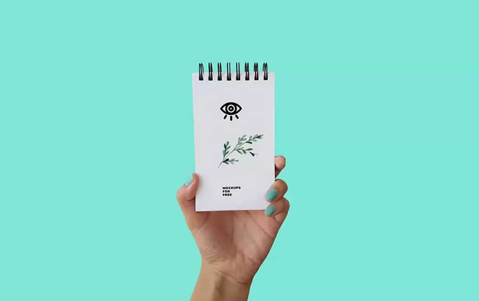 Notepad In Hand Mockup