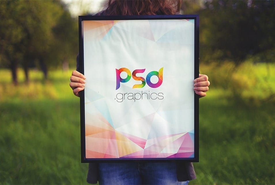 Woman Holding Poster Frame in Hand Mockup