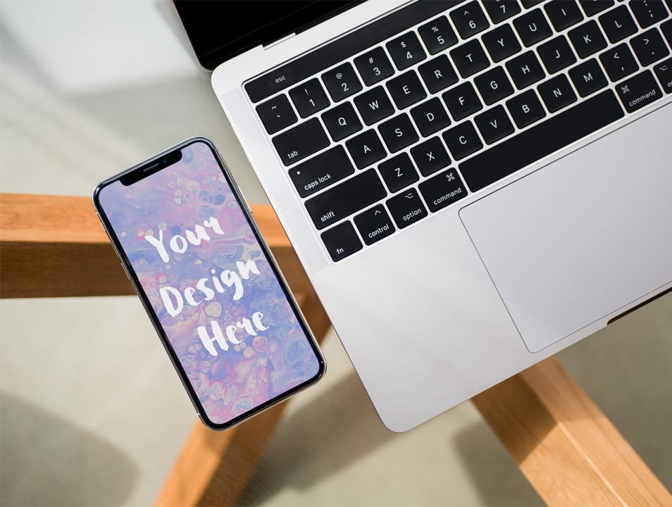 iPhone next to MacBook Pro Mockup