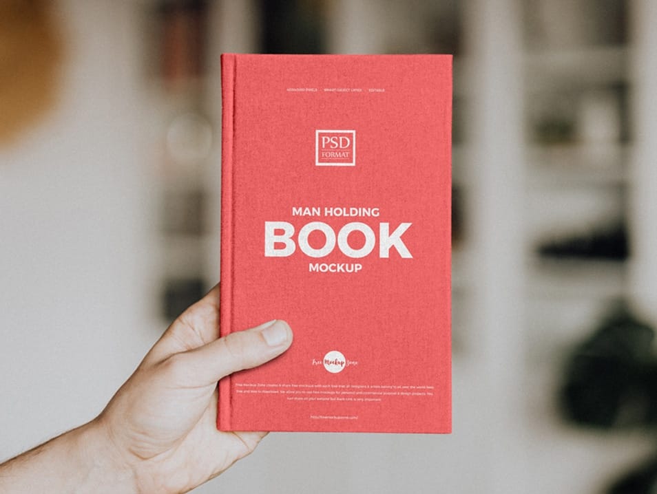 Free Man Holding Book Mockup