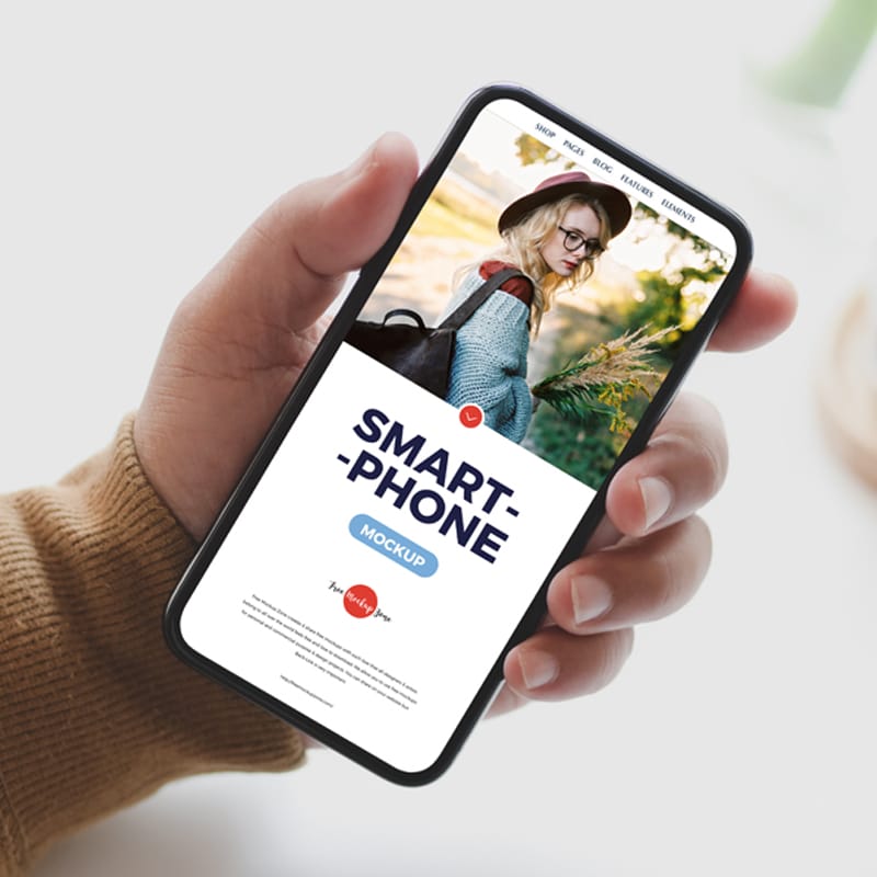 Free Man Holding Elegant Smartphone Mockup