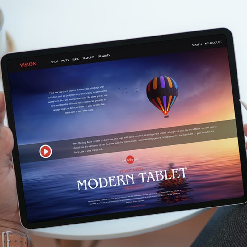 Free Person Using Modern Tablet Mockup