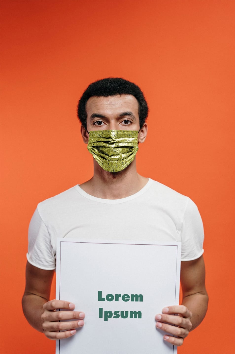 Man in a Face Mask Holding the Poster
