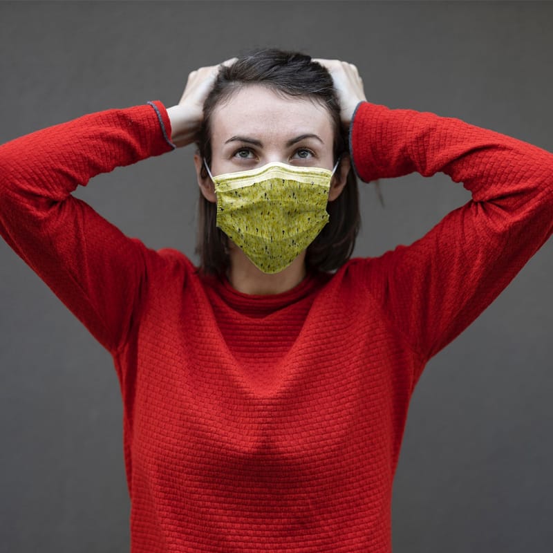 Mask Mockup With Young Woman in Red Sweater