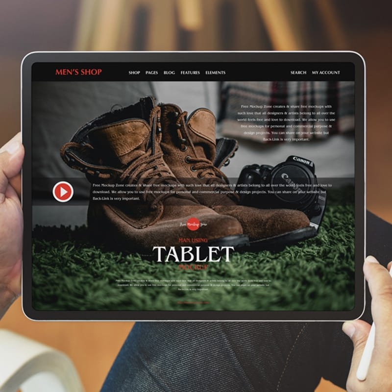 Free Man Using Tablet Mockup PSD