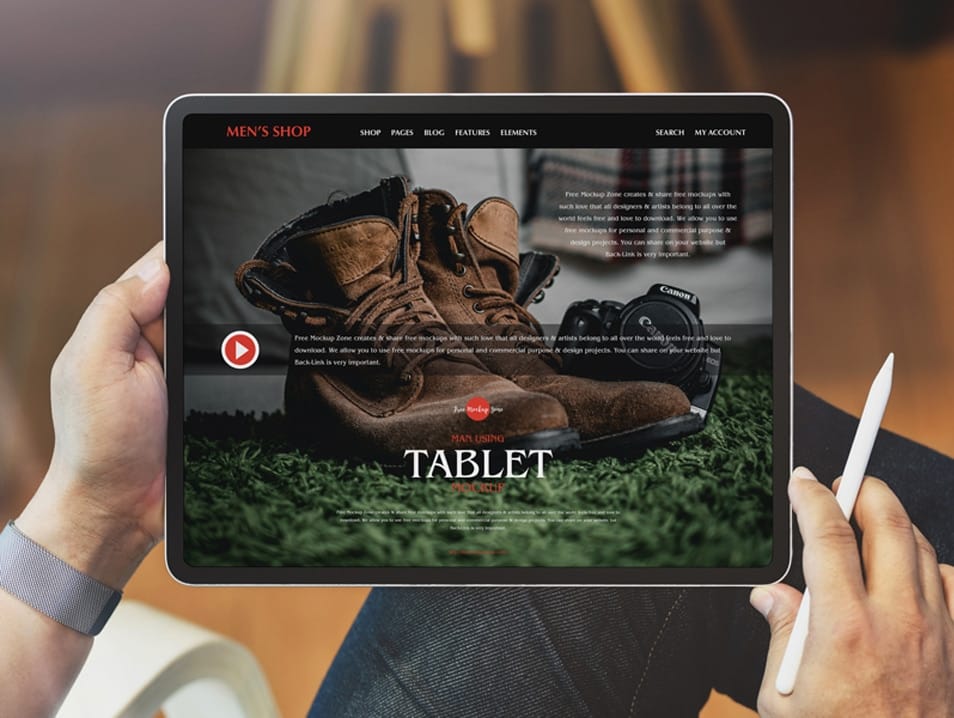 Free Man Using Tablet Mockup PSD