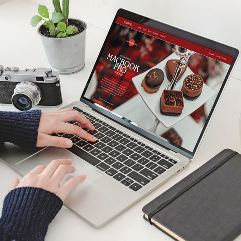 Free PSD Person Using MacBook Pro Mockup