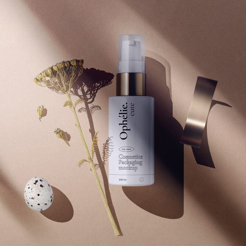 Cosmetics Bottle With Yarrow Mockup Top View