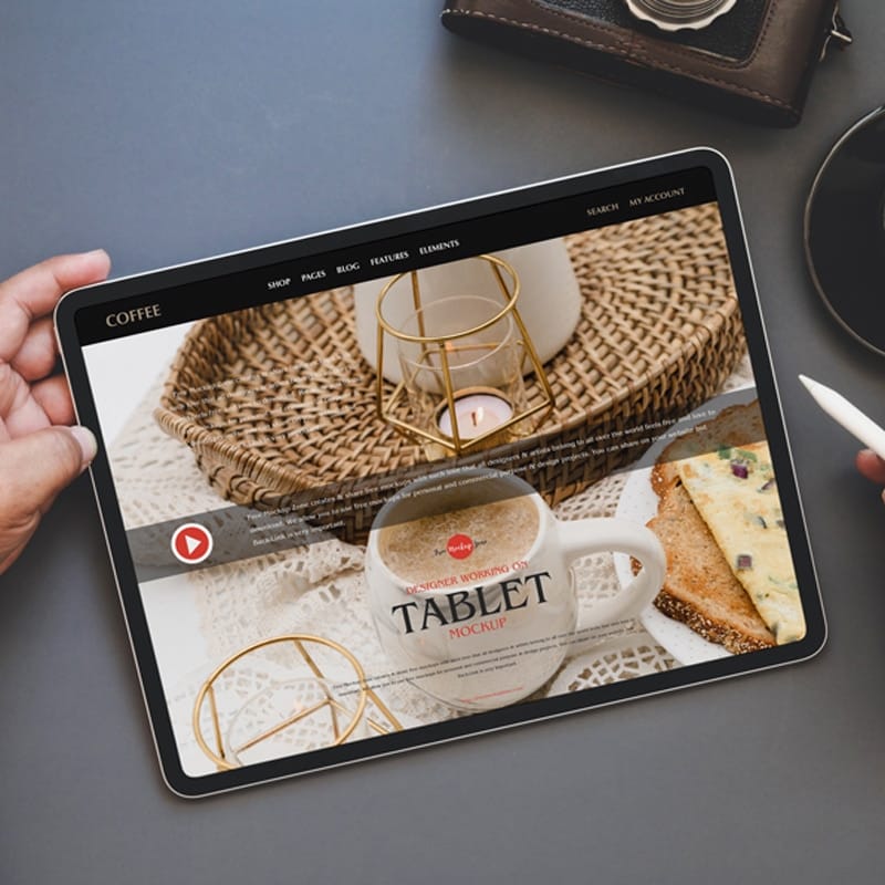 Free Designer Working on Tablet Mockup
