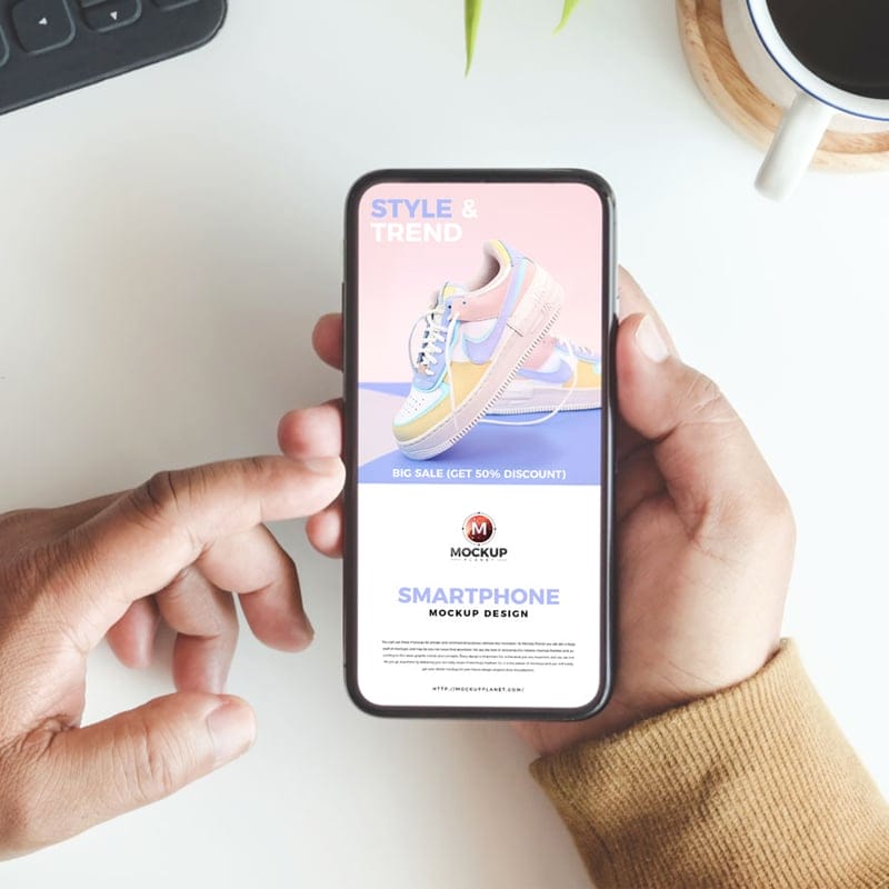 Free Man Holding Smartphone Mockup Design