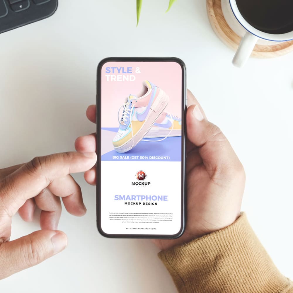 Free Man Holding Smartphone Mockup Design