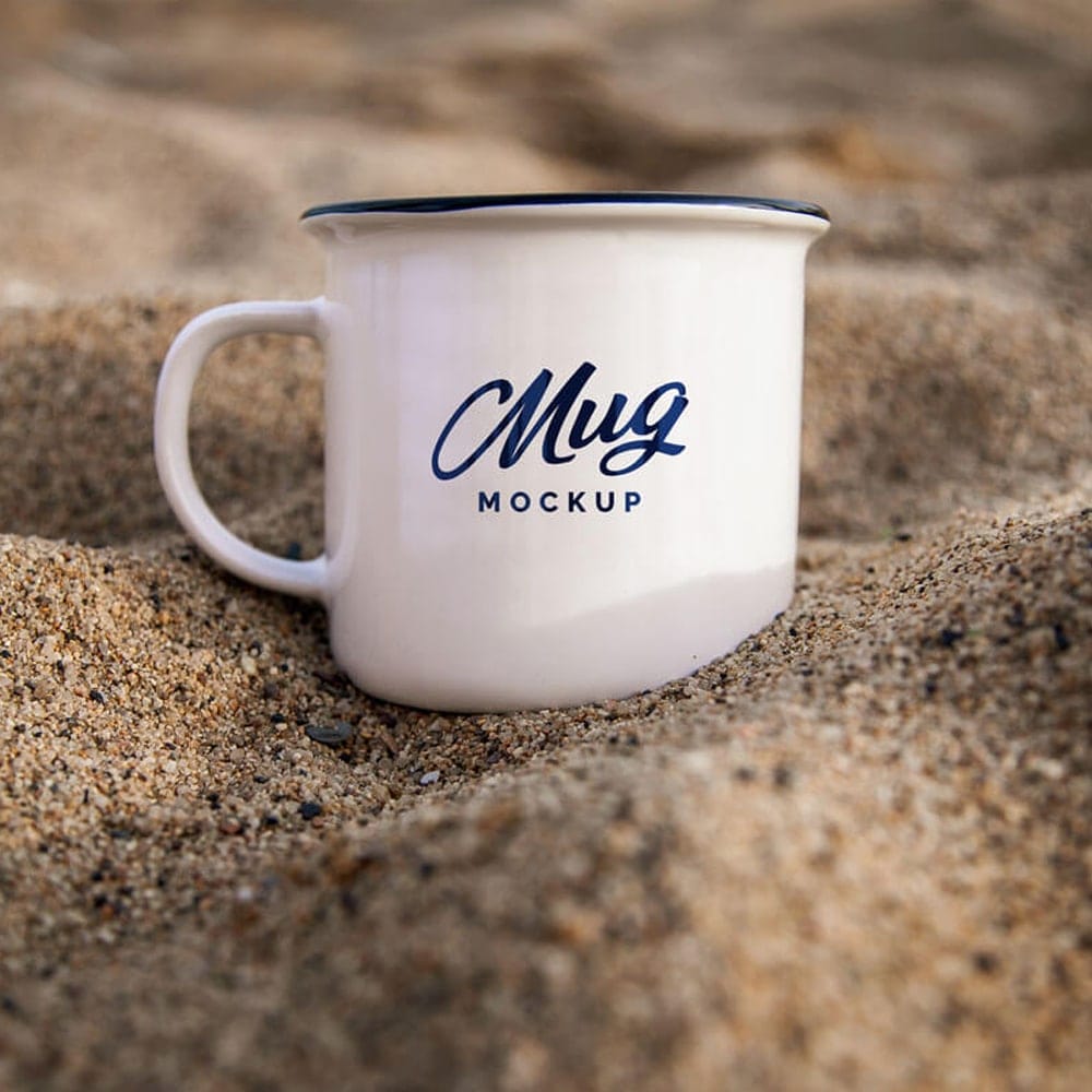 Free Mug in Sand Mockup PSD
