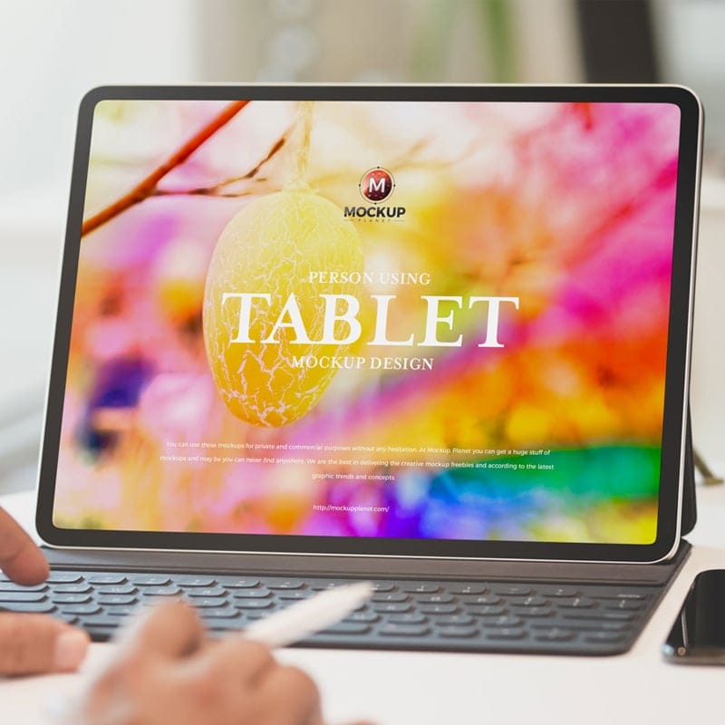 Free Person Using Tablet Mockup Design