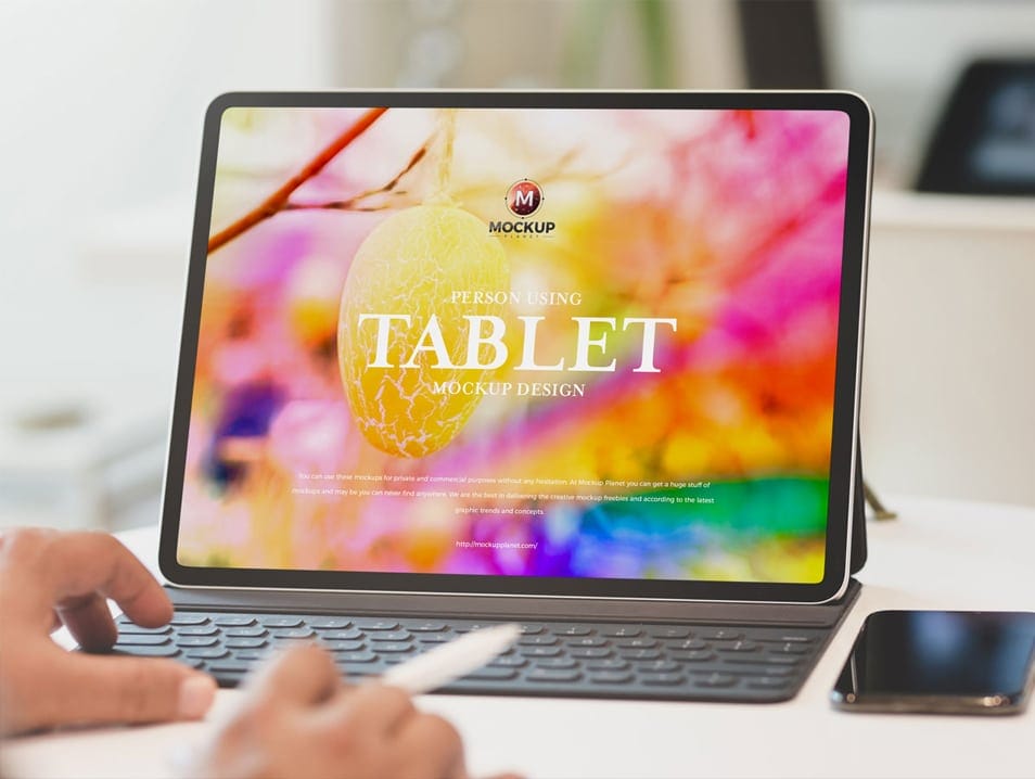 Free Person Using Tablet Mockup Design