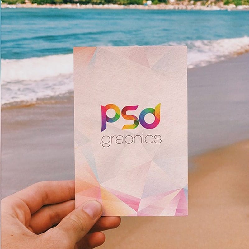 Holding Post Card in Hand Mockup PSD