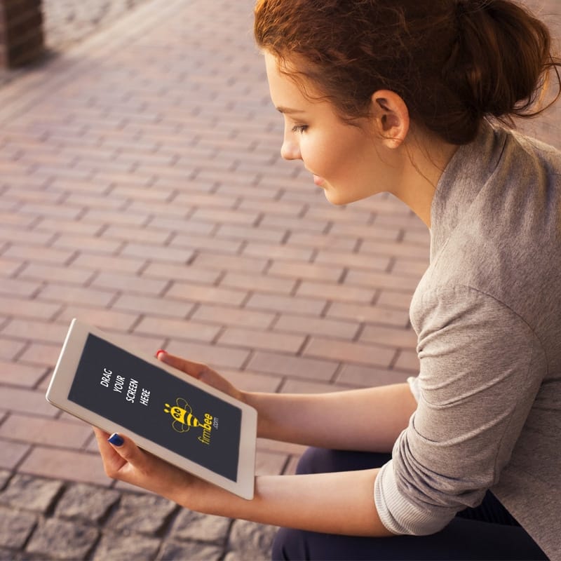 Woman with Apple iPad - Free PSD Mockup