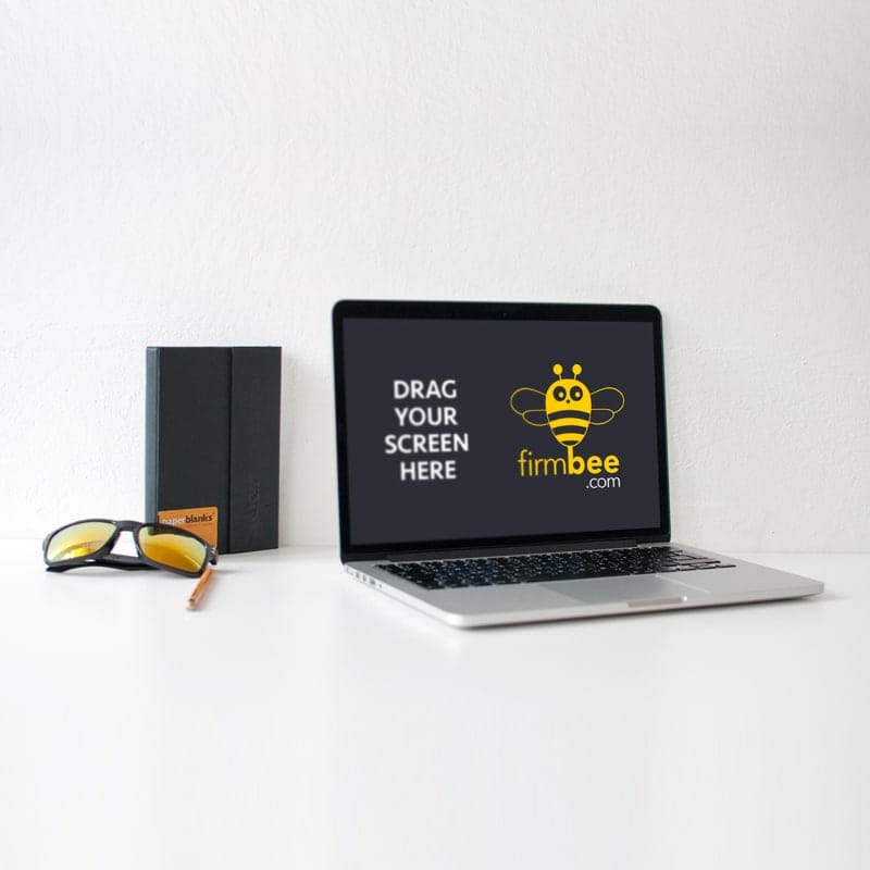 Apple MacBook on the Table Mockup