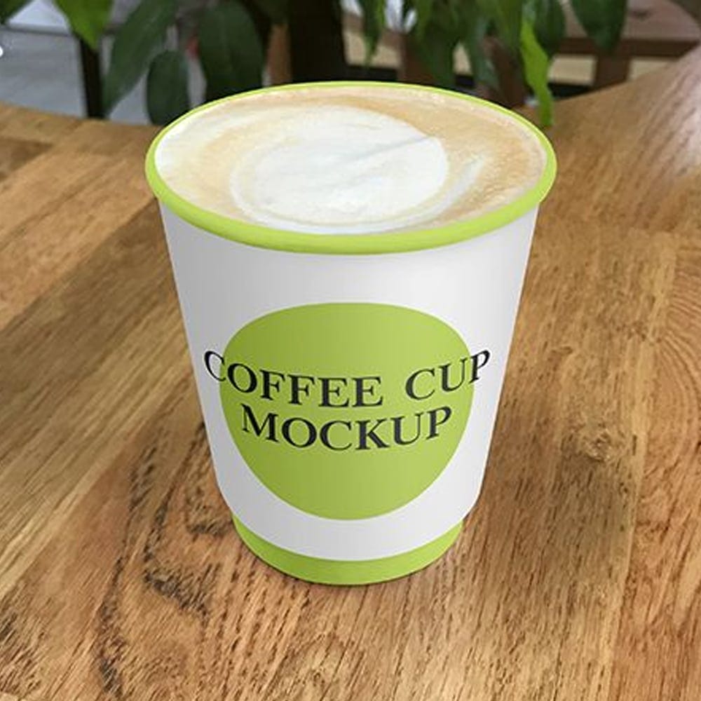 Free Paper Coffee Cup on Cafe Table Mockups