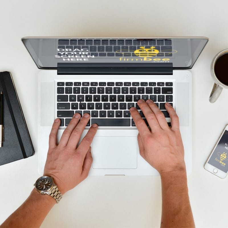 Freelancer with MacBook Mockup PSD