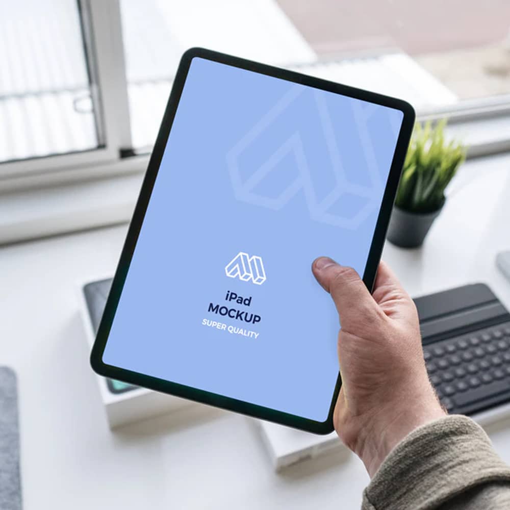 Tablet In Hand Mockup