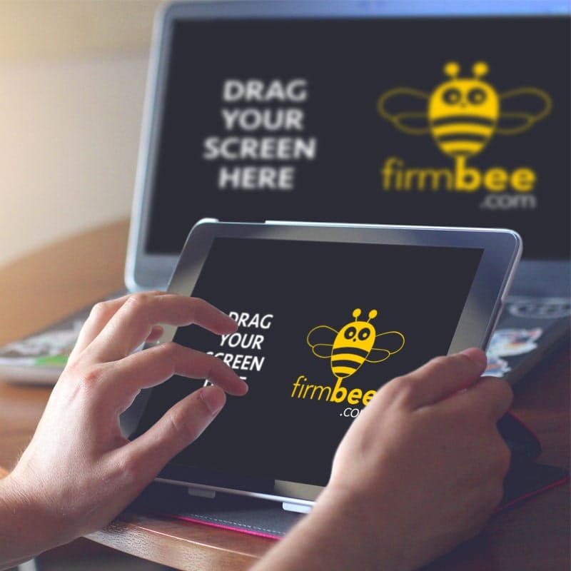 Woman Uses Apple iPad 2 & Laptop