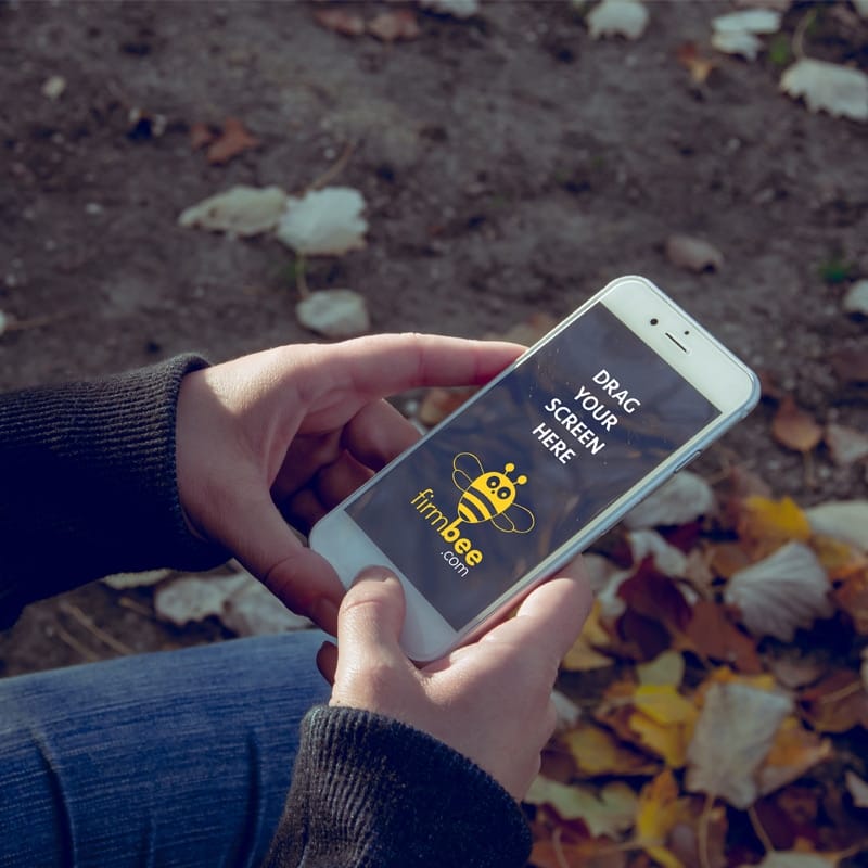 Woman with Apple iPhone PSD Mockup