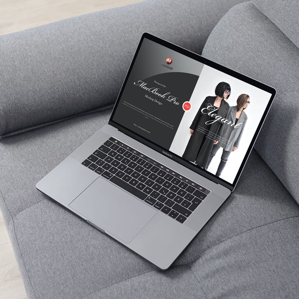 Free MacBook Pro Placing on Sofa Mockup Design