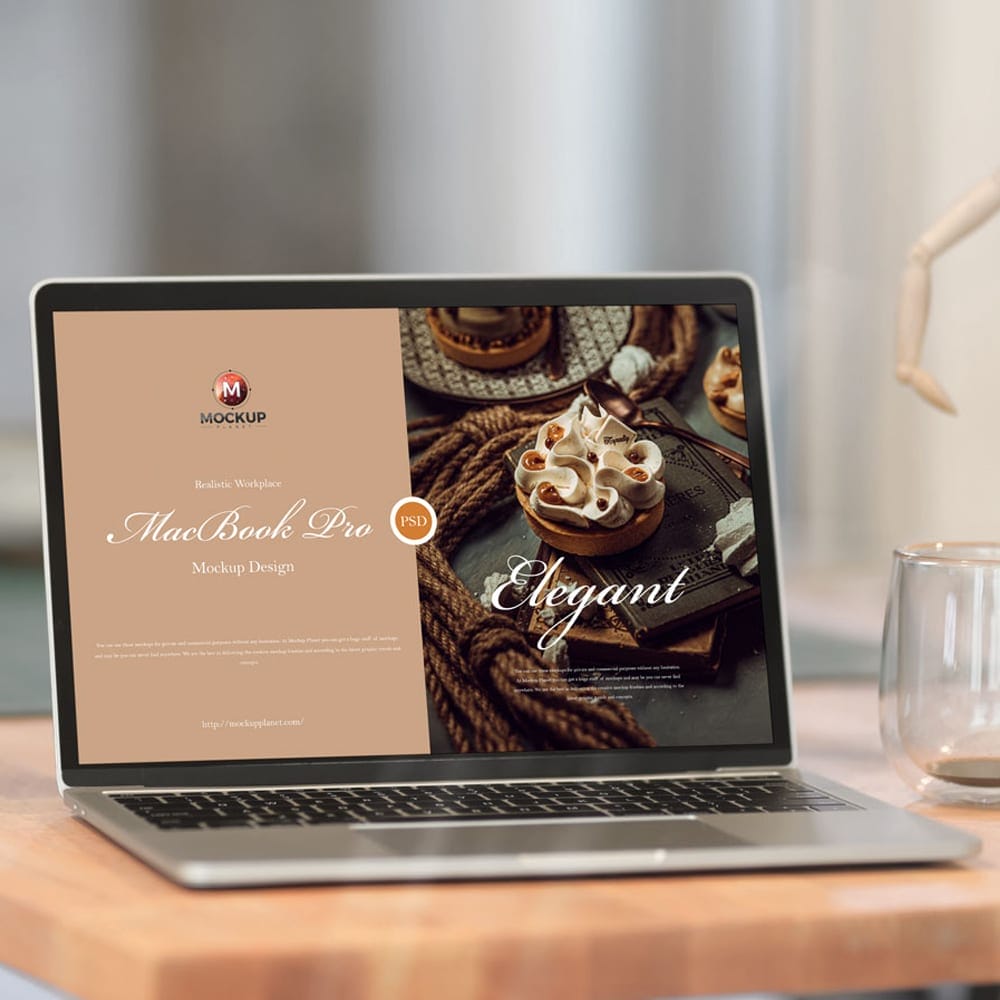 Free Realistic Workplace MacBook Pro Mockup Design