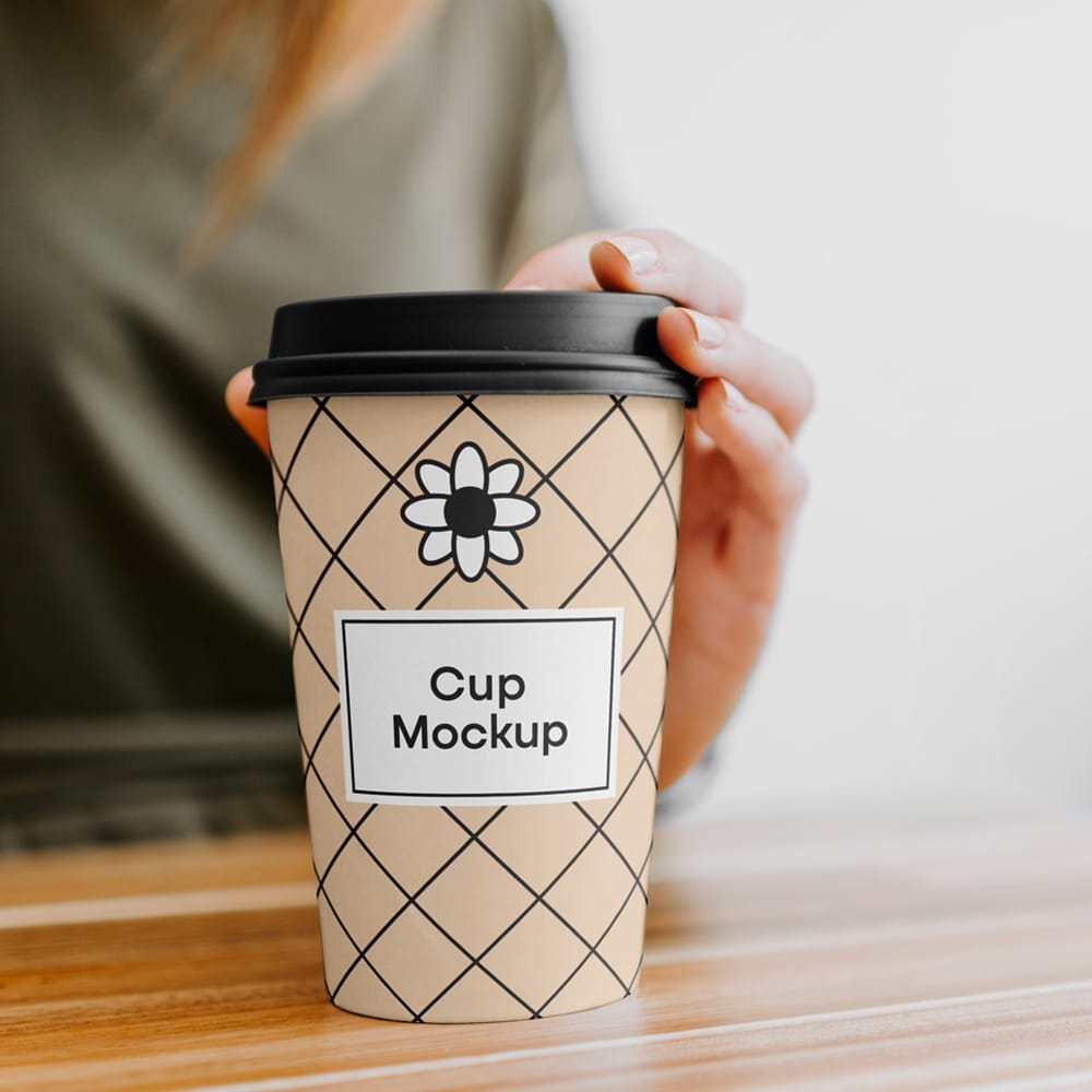 Coffee Cup with Hand Mockup