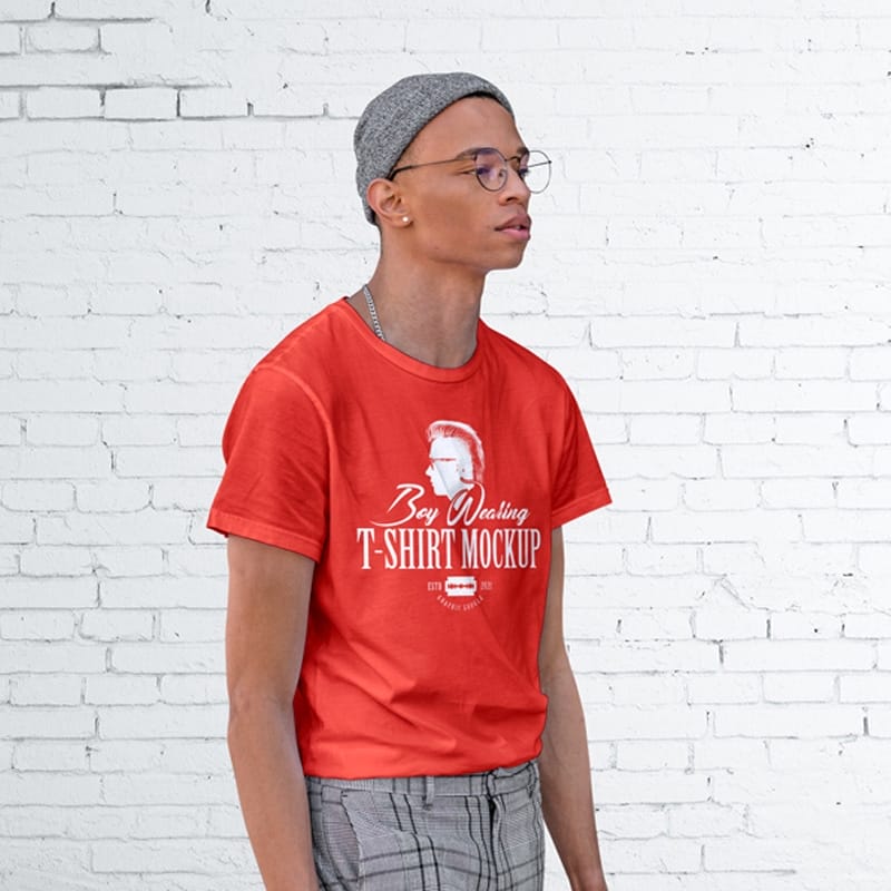 Free Boy Wearing T-Shirt Mockup