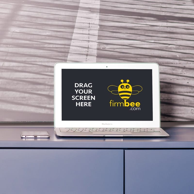 MacBook Air in the Living Room Mockup PSD